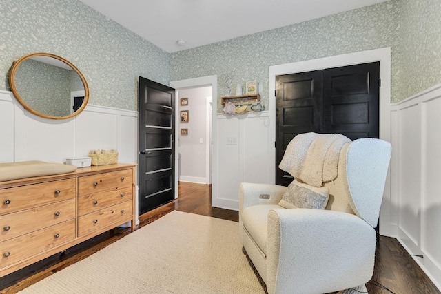 sitting room with dark hardwood / wood-style floors