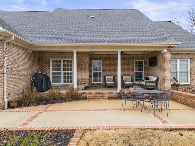 back of property featuring a patio area