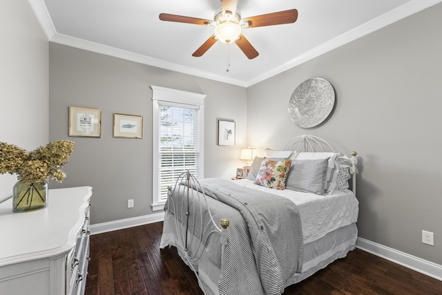 bedroom with crown molding, ceiling fan, and dark wood-type flooring