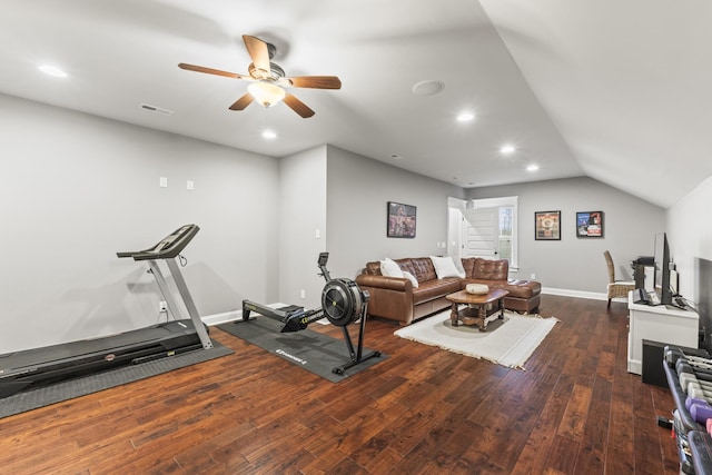 workout room with ceiling fan, dark hardwood / wood-style flooring, and lofted ceiling