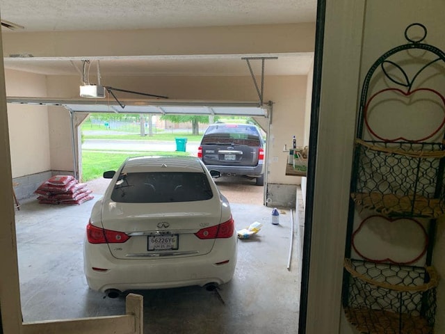 garage featuring a garage door opener