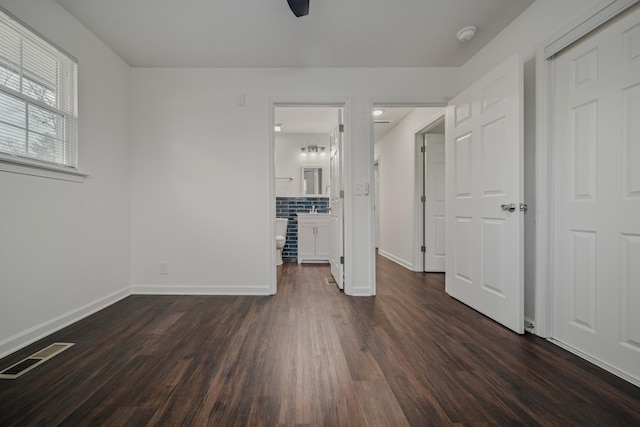 empty room featuring dark hardwood / wood-style floors