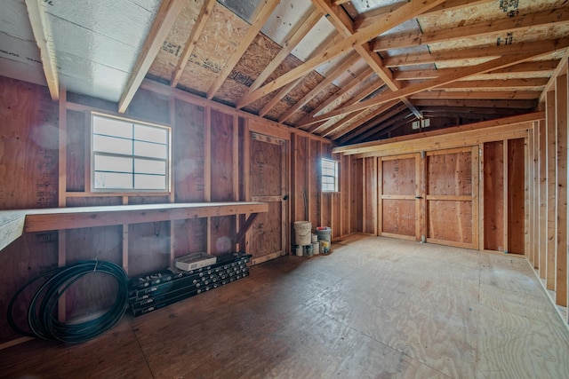 misc room featuring lofted ceiling