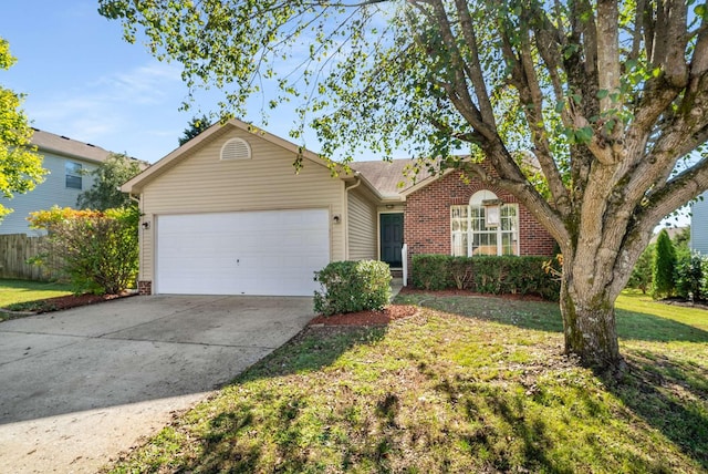 ranch-style house with a garage and a front lawn