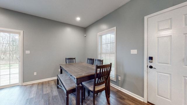 dining room with dark hardwood / wood-style floors