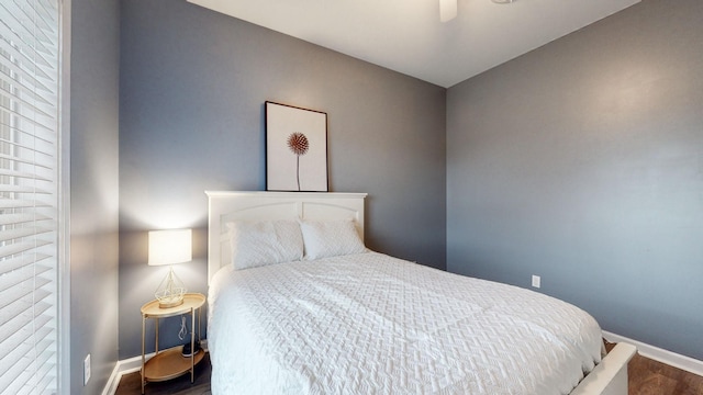 bedroom featuring ceiling fan and wood-type flooring