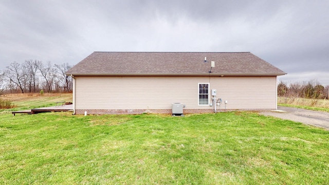 view of property exterior featuring a yard