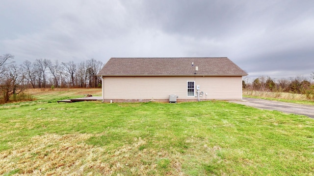 view of home's exterior featuring a lawn