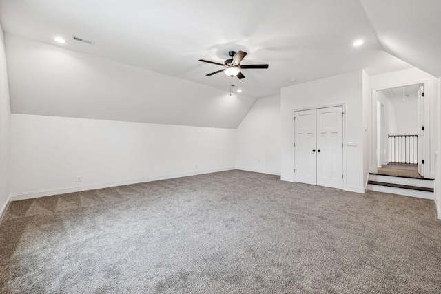 bonus room with carpet, ceiling fan, and lofted ceiling