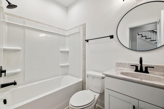 full bathroom with vanity, toilet, and shower / washtub combination