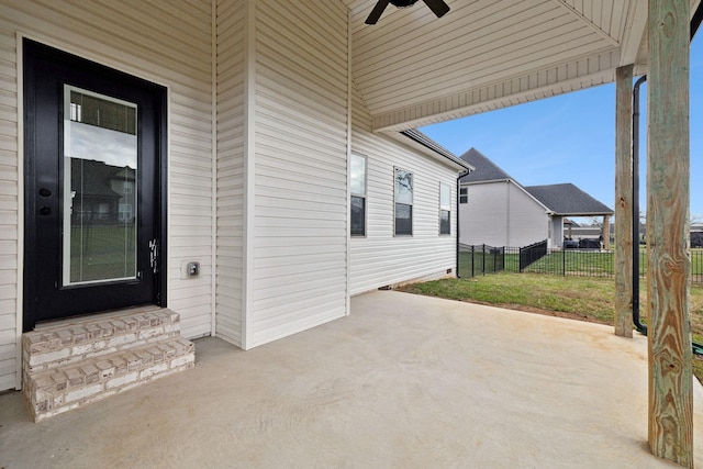 view of patio featuring ceiling fan