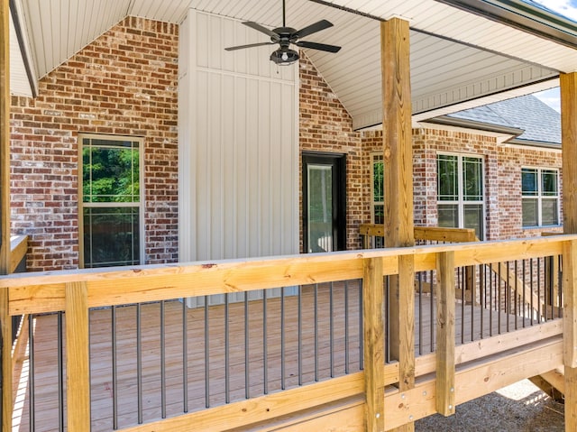 wooden terrace featuring ceiling fan