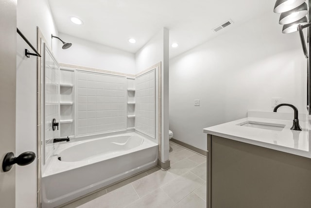 full bathroom featuring vanity, tile patterned floors,  shower combination, and toilet