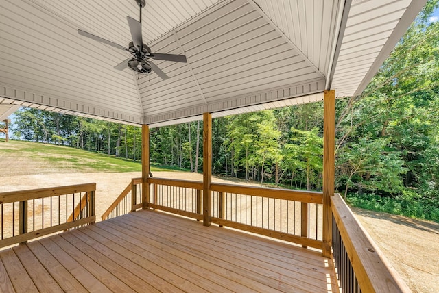 wooden deck featuring ceiling fan