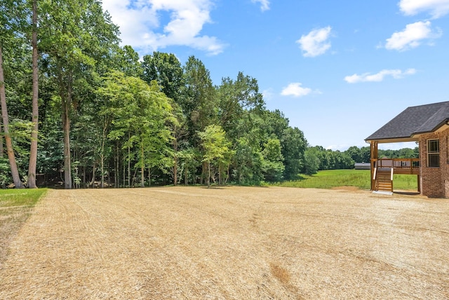 view of yard featuring a deck