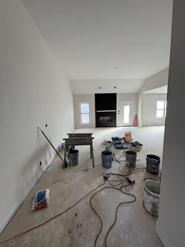 living room with vaulted ceiling