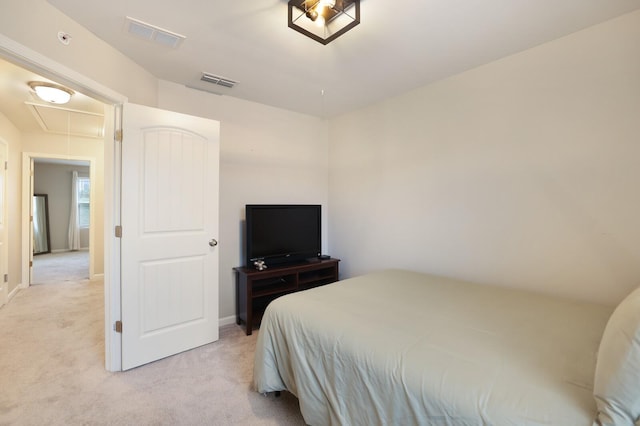 bedroom with light carpet