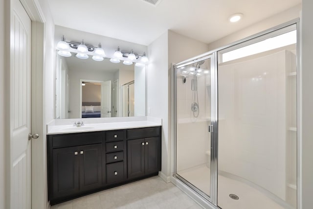 bathroom with vanity and an enclosed shower