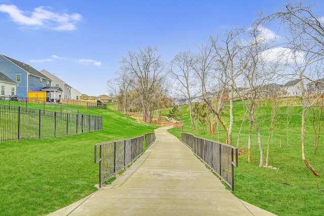 view of community featuring a yard