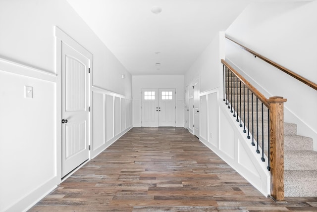 foyer with dark wood-type flooring