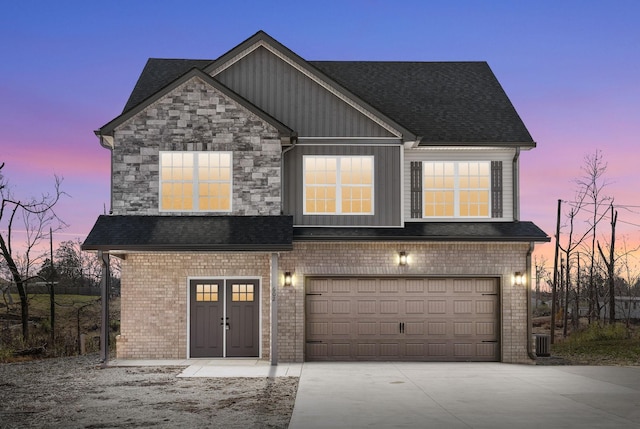 view of front of home featuring a garage