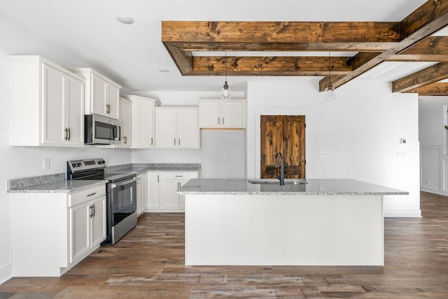 kitchen with white cabinets, stainless steel appliances, and sink