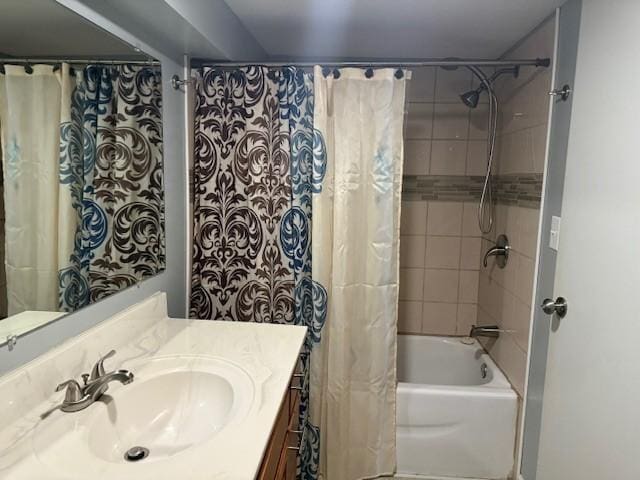 bathroom with vanity and shower / tub combo with curtain