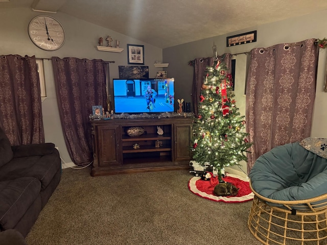 carpeted living area with vaulted ceiling