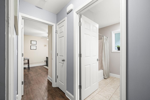 hallway featuring light hardwood / wood-style flooring