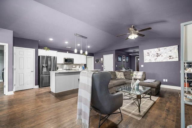 living room with dark hardwood / wood-style floors, vaulted ceiling, and ceiling fan