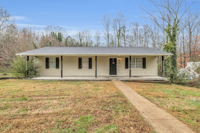 ranch-style home with a porch and a front yard