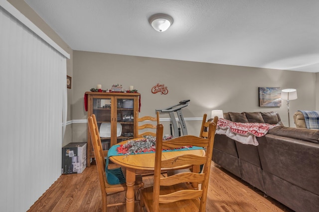 dining room featuring hardwood / wood-style flooring