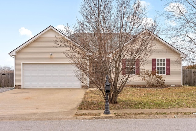 ranch-style home featuring a garage