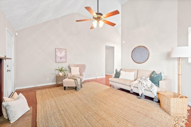 living room featuring ceiling fan and high vaulted ceiling