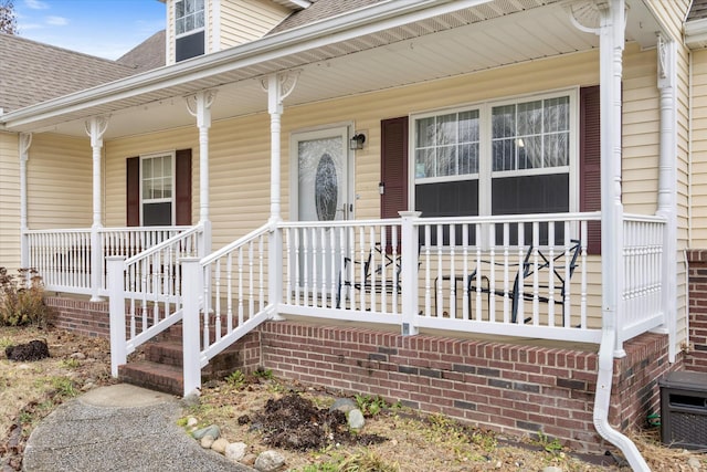 entrance to property featuring covered porch