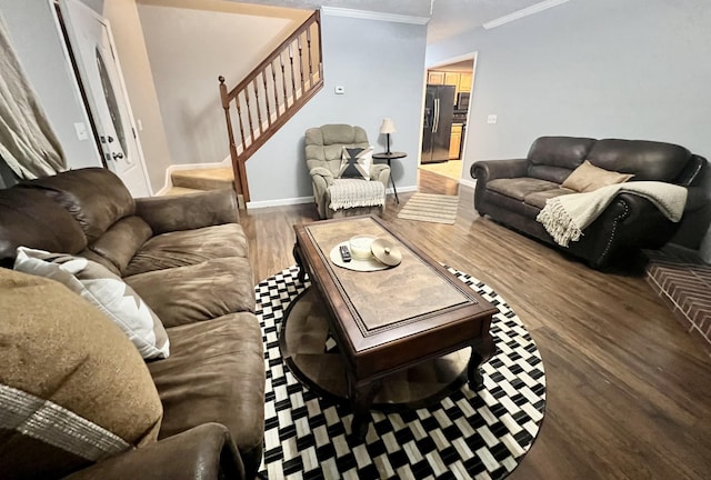 living room with crown molding and wood-type flooring