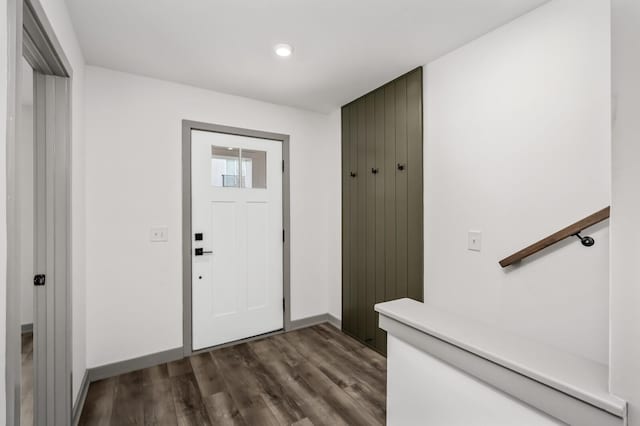 foyer with dark hardwood / wood-style flooring