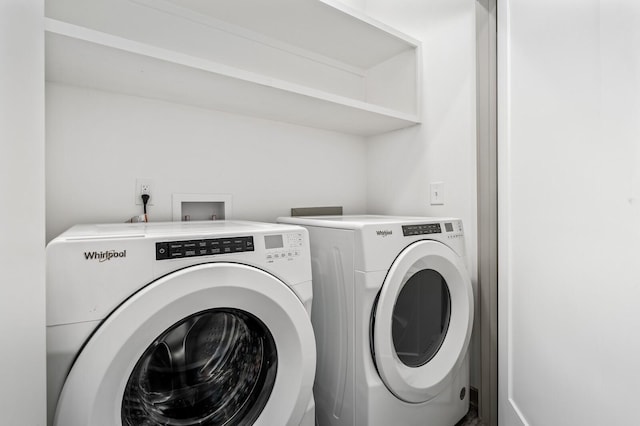 laundry area featuring independent washer and dryer