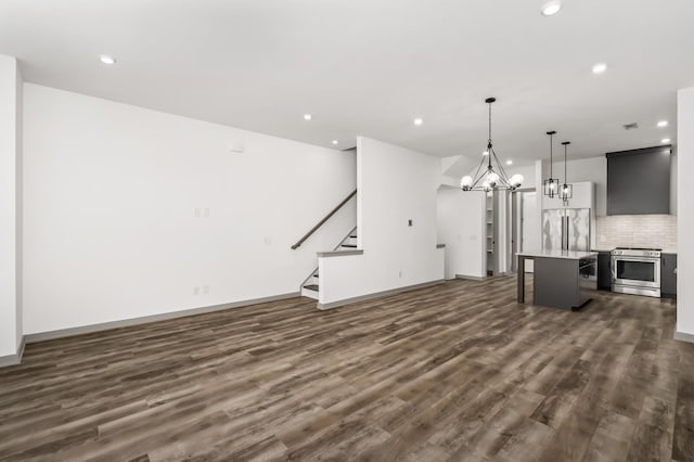 interior space with a chandelier and dark wood-type flooring