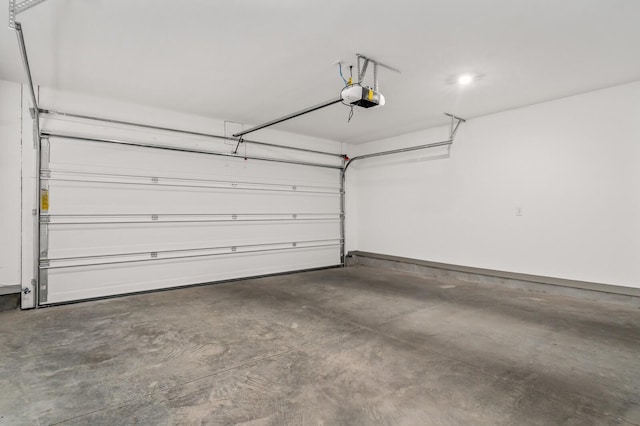 garage featuring a garage door opener