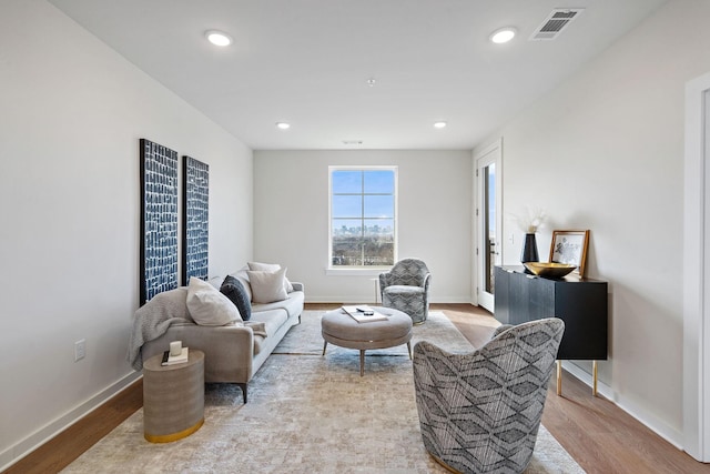 living room with light hardwood / wood-style floors