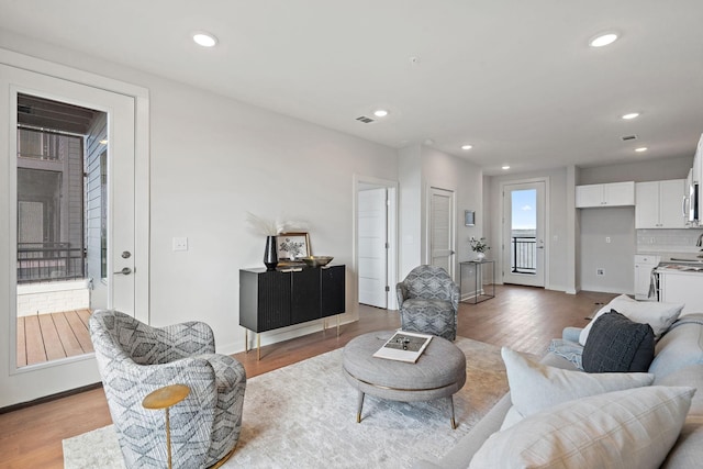 living room featuring light wood-type flooring