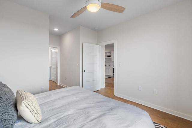 bedroom featuring ceiling fan and wood-type flooring