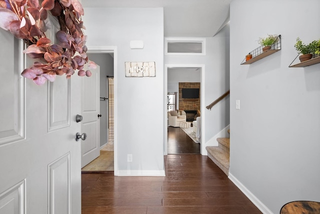 entrance foyer featuring dark hardwood / wood-style flooring