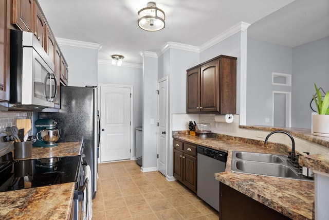 kitchen featuring dark brown cabinetry, sink, tasteful backsplash, crown molding, and appliances with stainless steel finishes