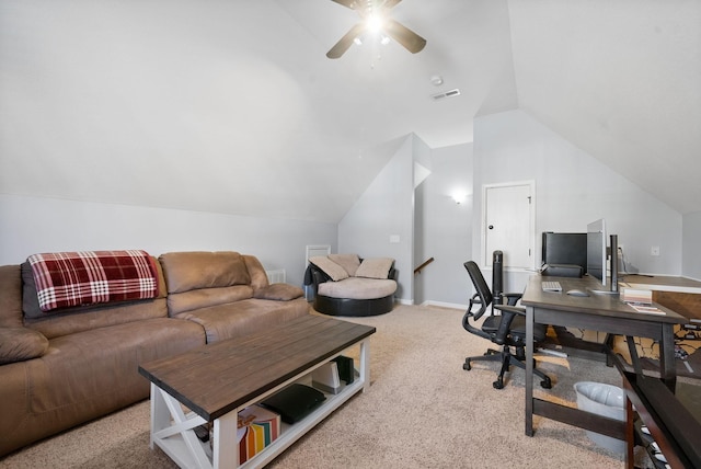 office area with ceiling fan, light colored carpet, and vaulted ceiling