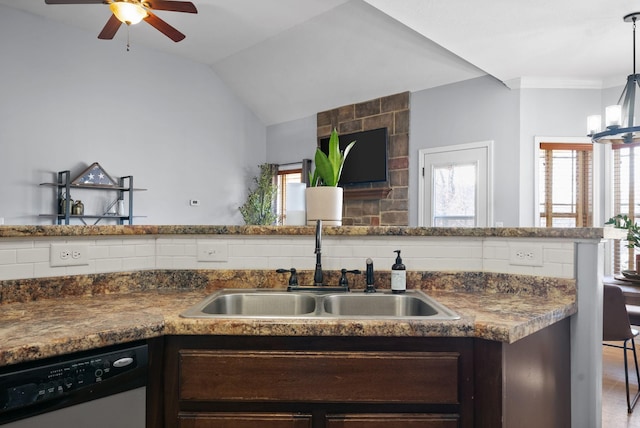 kitchen featuring white dishwasher, decorative backsplash, lofted ceiling, and sink