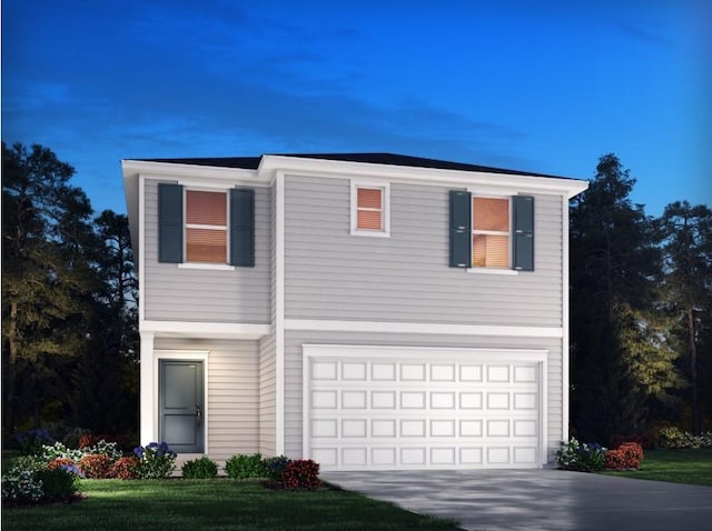 view of front of house with a front lawn and a garage