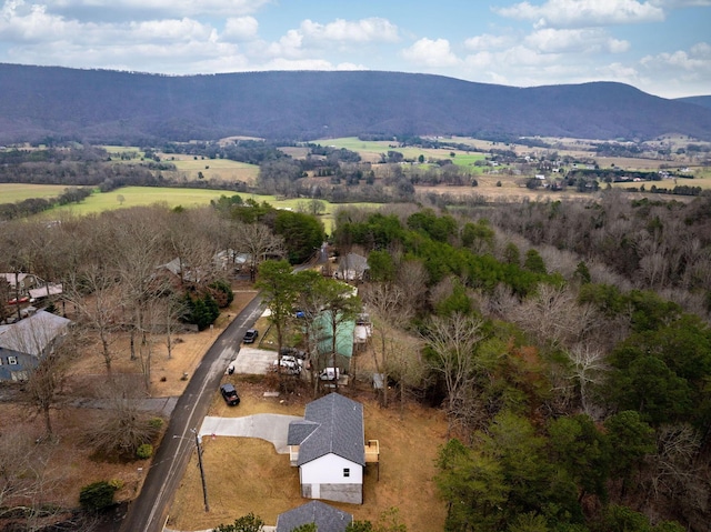 drone / aerial view featuring a mountain view