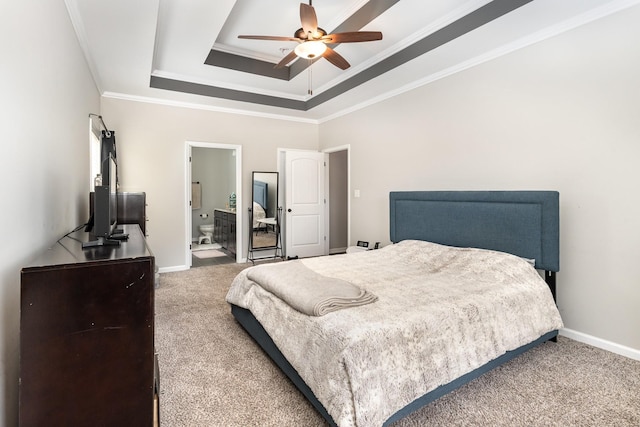 bedroom with ceiling fan, carpet floors, crown molding, and connected bathroom